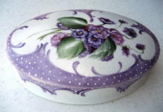 8 inch ovel box wih violets